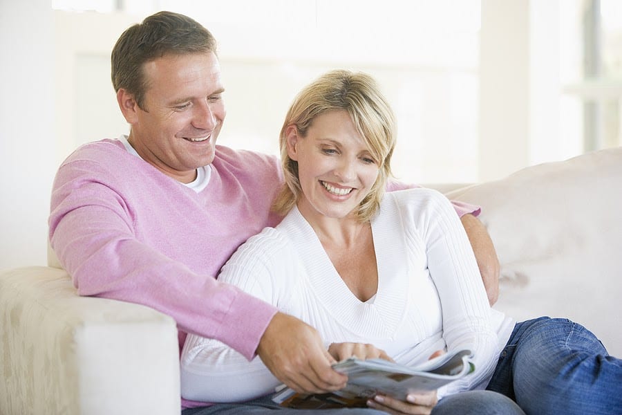 Couple Relaxing with a Magazine