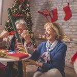 happy senior couple celebrating the holidays