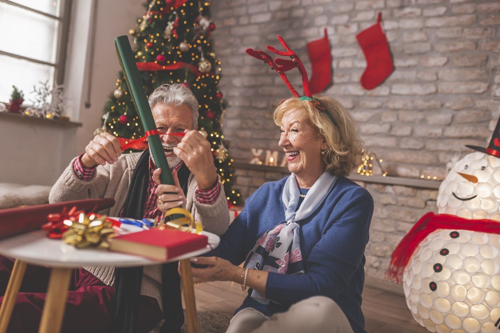 happy senior couple celebrating the holidays