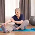 Woman exercising to improve her hormone levels naturally