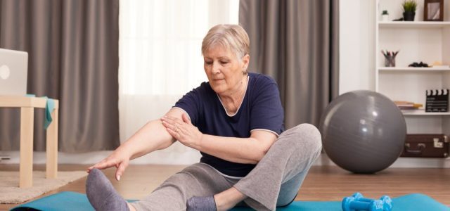 Woman exercising to improve her hormone levels naturally