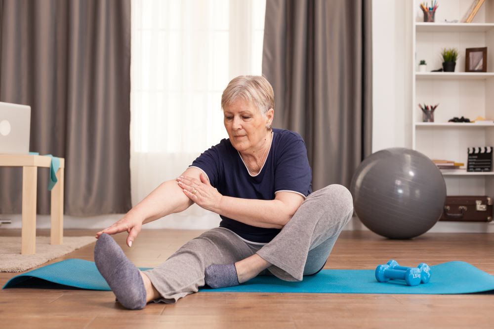 Woman exercising to improve her hormone levels naturally