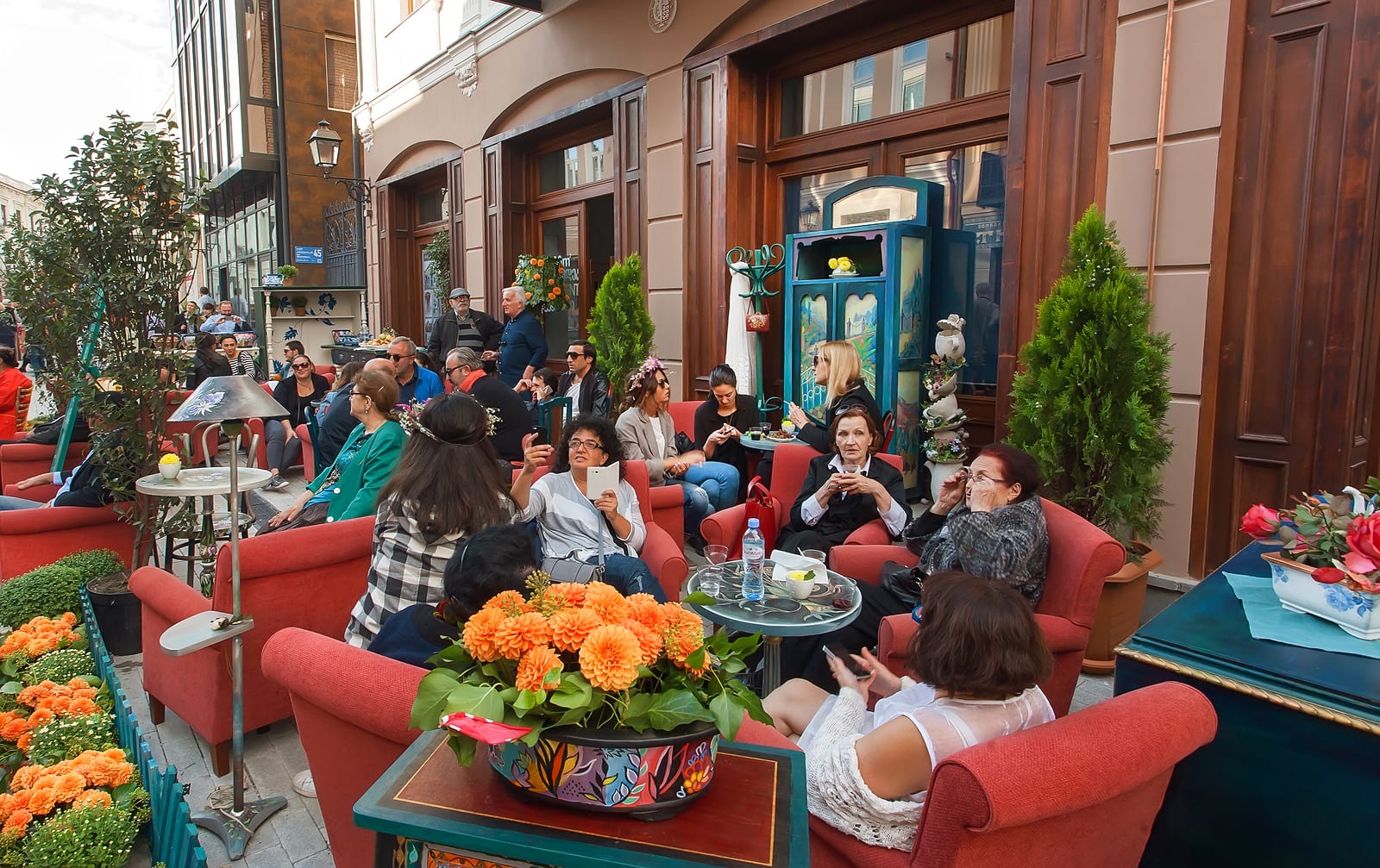 TBILISI, GEORGIA - SEP 25, 2016: Older women sitting in a outdoor restaurant talking and enjoying together during the weekend on September 25, 2016. Tbilisi has population of 1.5 million people