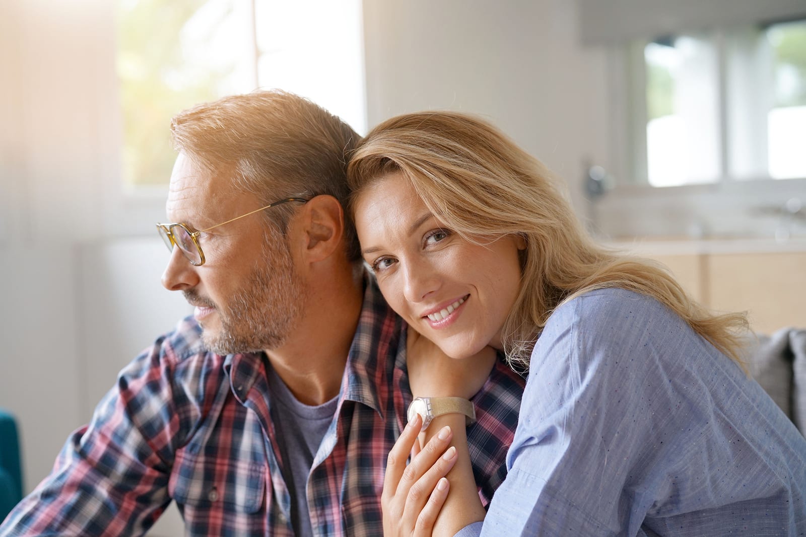 Portrait of mature couple relaxing at home