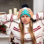 A woman stressed over how the holidays are affecting her hormonal health. Source: FreePik