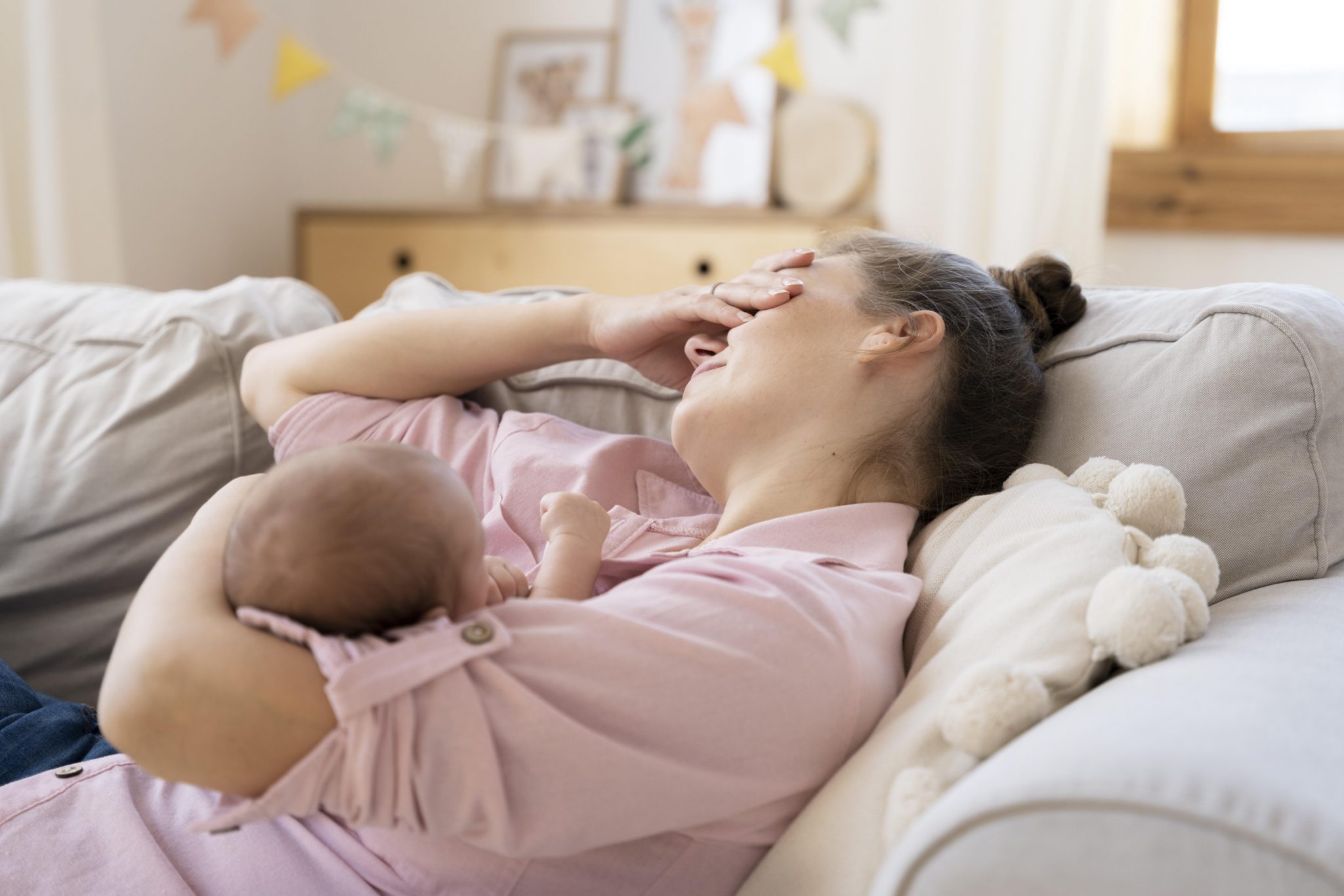 Woman dealing with postpartum hormonal imbalance